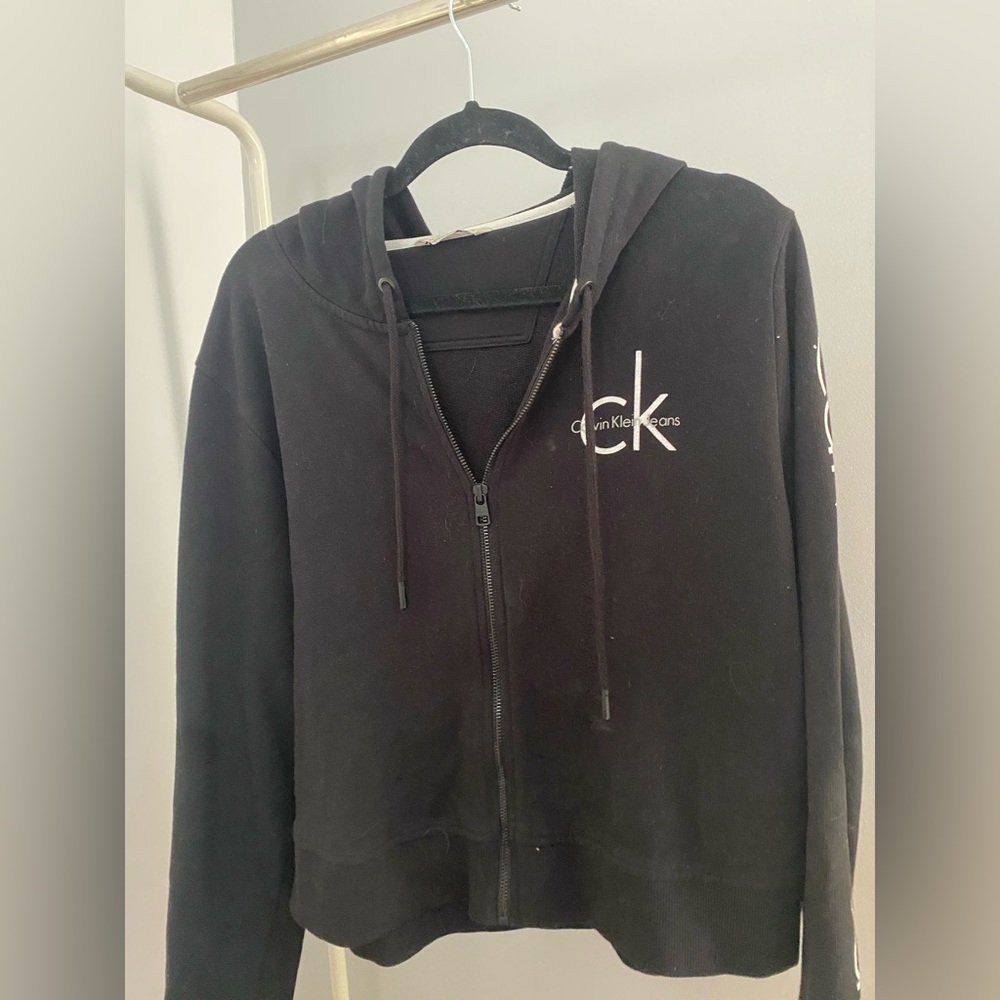Black Calvin Klein zip up.